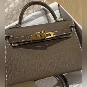 Elegant Brown Handbag with Gold Accents